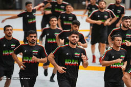 رمزگشایی از اقدام جنجالی تیم ملی کشتی: راز لباس‌های مشکی چیست؟ (عکس)